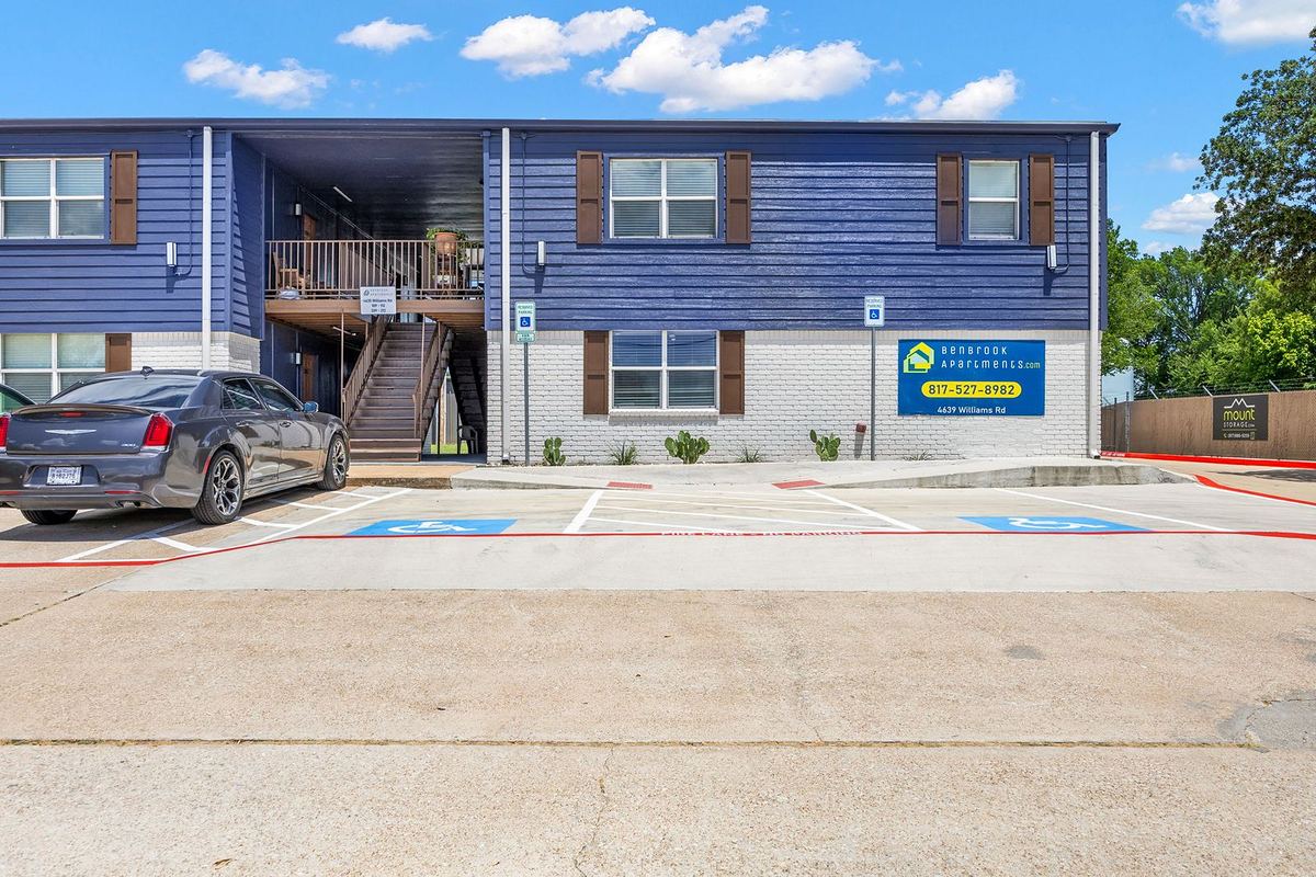 Building entry with accessible parking spaces