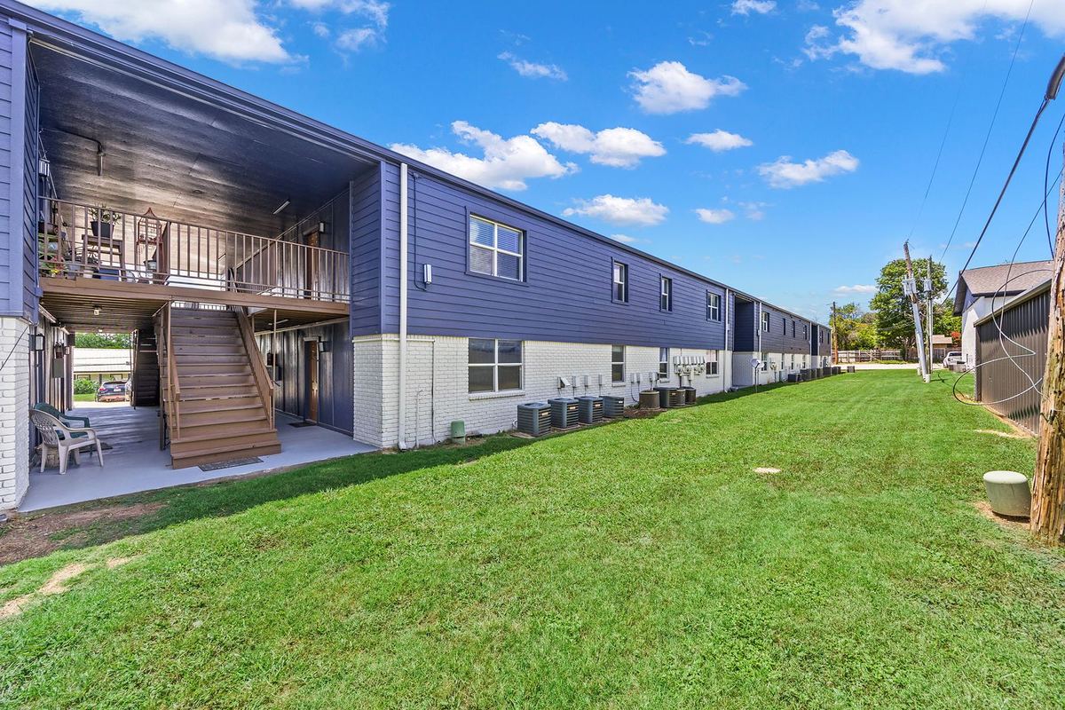 Open lawn behind the apartments